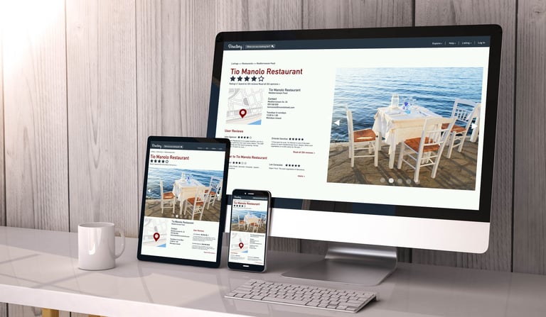 Digital generated devices on desktop, responsive blank mock-up with online directory website on screen. All screen graphics are made up. 3d rendering.